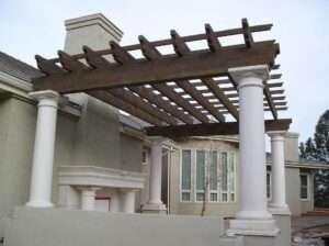 A large wood pergola finished with exterior semi-solid wood stain.